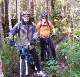 Two mountain bikers on Woodpecker trail